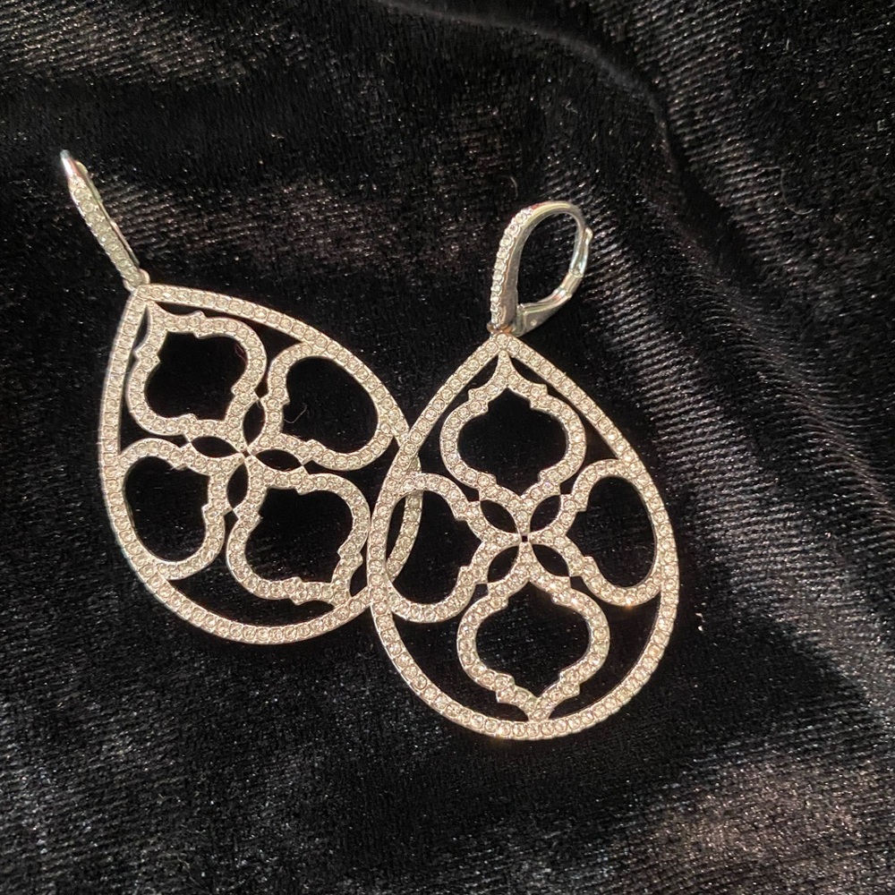 Beautiful pair of drop earrings started with crystals.